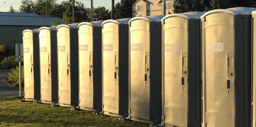 porta potties at sunset
